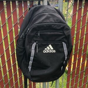 adidas Black Backpack with White Logo and Stripe Accents 4 Zippers area.